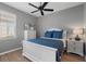 Charming bedroom with a full bed and a ceiling fan at 11550 Blackfin St, Venice, FL 34292