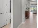 Bright and airy entryway with tile flooring and modern decor at 11550 Blackfin St, Venice, FL 34292