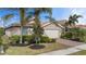 Well-maintained house with attractive landscaping and a two-car garage at 11550 Blackfin St, Venice, FL 34292