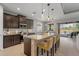 Modern kitchen with granite countertops and stainless steel appliances at 11550 Blackfin St, Venice, FL 34292
