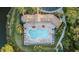Community pool with plenty of lounge chairs at 11550 Blackfin St, Venice, FL 34292