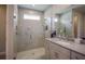 Modern bathroom with a large walk-in shower and contemporary vanity at 11786 Sistine Ln, Venice, FL 34293