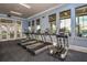 Well-equipped community fitness center with treadmills and elliptical machines at 11786 Sistine Ln, Venice, FL 34293