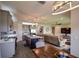 Open concept dining area, kitchen, and living room at 11786 Sistine Ln, Venice, FL 34293