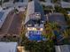 Drone view of the house, pool, and roof deck at 150 Grant Dr, Sarasota, FL 34236