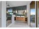 Spa-like bathroom with double vanity, walk-in shower, and freestanding tub at 150 Grant Dr, Sarasota, FL 34236