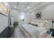 Bedroom with a king-size bed and large window at 150 Grant Dr, Sarasota, FL 34236