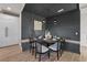 Built-in dining nook with dark wood table and bench seating at 150 Grant Dr, Sarasota, FL 34236