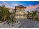 Beautiful two-story house with a two-car garage and nicely landscaped yard at 150 Grant Dr, Sarasota, FL 34236