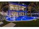 Two-story home with a pool and lush landscaping at 150 Grant Dr, Sarasota, FL 34236