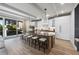 Modern kitchen with large island, stainless steel appliances, and white cabinetry at 150 Grant Dr, Sarasota, FL 34236