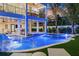 Stunning pool with a waterslide and lounge chairs at 150 Grant Dr, Sarasota, FL 34236