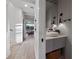 Stylish powder room with modern sink and geometric tile at 150 Grant Dr, Sarasota, FL 34236