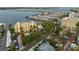 Aerial view of waterfront property, showcasing the building and marina at 1510 1St W Ave # 504, Bradenton, FL 34205