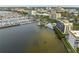 Aerial perspective of waterfront property, marina, and city skyline at 1510 1St W Ave # 504, Bradenton, FL 34205