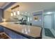 Kitchen features a breakfast bar and views into the dining area at 1510 1St W Ave # 504, Bradenton, FL 34205