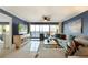 Living room features water views, comfy seating and tiled floors at 1510 1St W Ave # 504, Bradenton, FL 34205