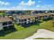 Community view showcasing townhomes near golf course at 17825 Gawthrop Dr # 104, Bradenton, FL 34211