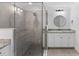 Bathroom boasts a large walk-in shower and granite vanity at 17825 Gawthrop Dr # 104, Bradenton, FL 34211