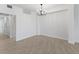 Bright dining area with tile floors and chandelier at 17825 Gawthrop Dr # 104, Bradenton, FL 34211