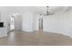 Elegant dining room with tile floors and chandelier at 17825 Gawthrop Dr # 104, Bradenton, FL 34211