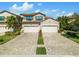 Luxury townhome with two-car garage and paver driveway at 17825 Gawthrop Dr # 104, Bradenton, FL 34211