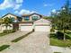 Two-car garage and attractive landscaping at 17825 Gawthrop Dr # 104, Bradenton, FL 34211