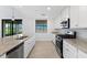 Modern kitchen with stainless steel appliances and granite countertops at 17825 Gawthrop Dr # 104, Bradenton, FL 34211