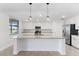 Modern kitchen with granite countertops and stainless steel appliances at 17825 Gawthrop Dr # 104, Bradenton, FL 34211