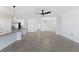 Spacious living room with tile floors and open concept layout at 17825 Gawthrop Dr # 104, Bradenton, FL 34211