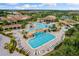 Large resort-style pool with a waterfall feature at 17825 Gawthrop Dr # 104, Bradenton, FL 34211
