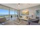 Modern living room boasts water views and stylish decor at 1800 Benjamin Franklin Dr # A1003, Sarasota, FL 34236