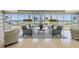 An inviting lounge area with comfortable couches and chairs with ocean views at 1800 Benjamin Franklin Dr # A405, Sarasota, FL 34236