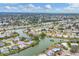 Expansive aerial view of waterfront community with many homes at 2271 Sandlewood Dr, Venice, FL 34293