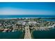 Aerial view of coastal community with beachfront properties at 235 Grant Dr, Sarasota, FL 34236