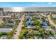Aerial view of a home with a pool, located near the beach at 235 Grant Dr, Sarasota, FL 34236