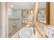 Spa-like bathroom with double vanity and walk-in shower at 235 Grant Dr, Sarasota, FL 34236