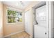 Bright laundry room with washer and dryer, and window at 235 Grant Dr, Sarasota, FL 34236