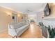 Living room with hardwood floors, fireplace, and built-in shelving at 235 Grant Dr, Sarasota, FL 34236
