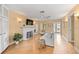 Bright living room with hardwood floors, fireplace, and comfy seating at 235 Grant Dr, Sarasota, FL 34236