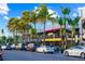 Vibrant street scene with shops and palm trees in St. Armands Circle at 235 Grant Dr, Sarasota, FL 34236