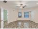 Spacious living room featuring tile flooring and a view to the pool at 2605 Desoto Rd, Sarasota, FL 34234