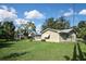 Large backyard with patio and grassy area at 3111 Taunton W Dr, Bradenton, FL 34205