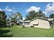 Large backyard with patio and grassy area at 3111 Taunton W Dr, Bradenton, FL 34205
