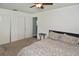 Bedroom with double bed, two closets, and side table at 3111 Taunton W Dr, Bradenton, FL 34205