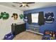 bedroom with dresser, toy storage, and hockey jerseys at 3111 Taunton W Dr, Bradenton, FL 34205