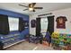bedroom with toy storage and sports jersey decor at 3111 Taunton W Dr, Bradenton, FL 34205
