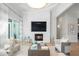 Spacious living room with fireplace and built-in media at 3260 Bayou Rd, Longboat Key, FL 34228