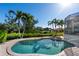 Relaxing freeform pool with a spa at 3260 Bayou Rd, Longboat Key, FL 34228