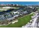 Community tennis courts near golf course and water at 3260 Bayou Rd, Longboat Key, FL 34228
